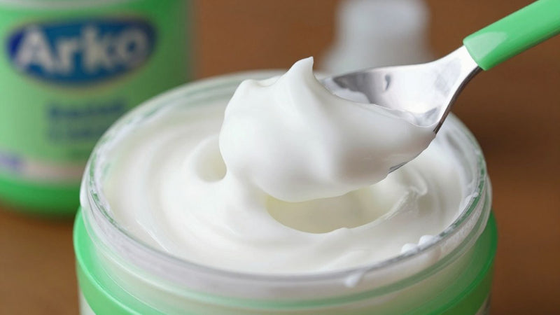 Arko Shaving Cream tub with white lather